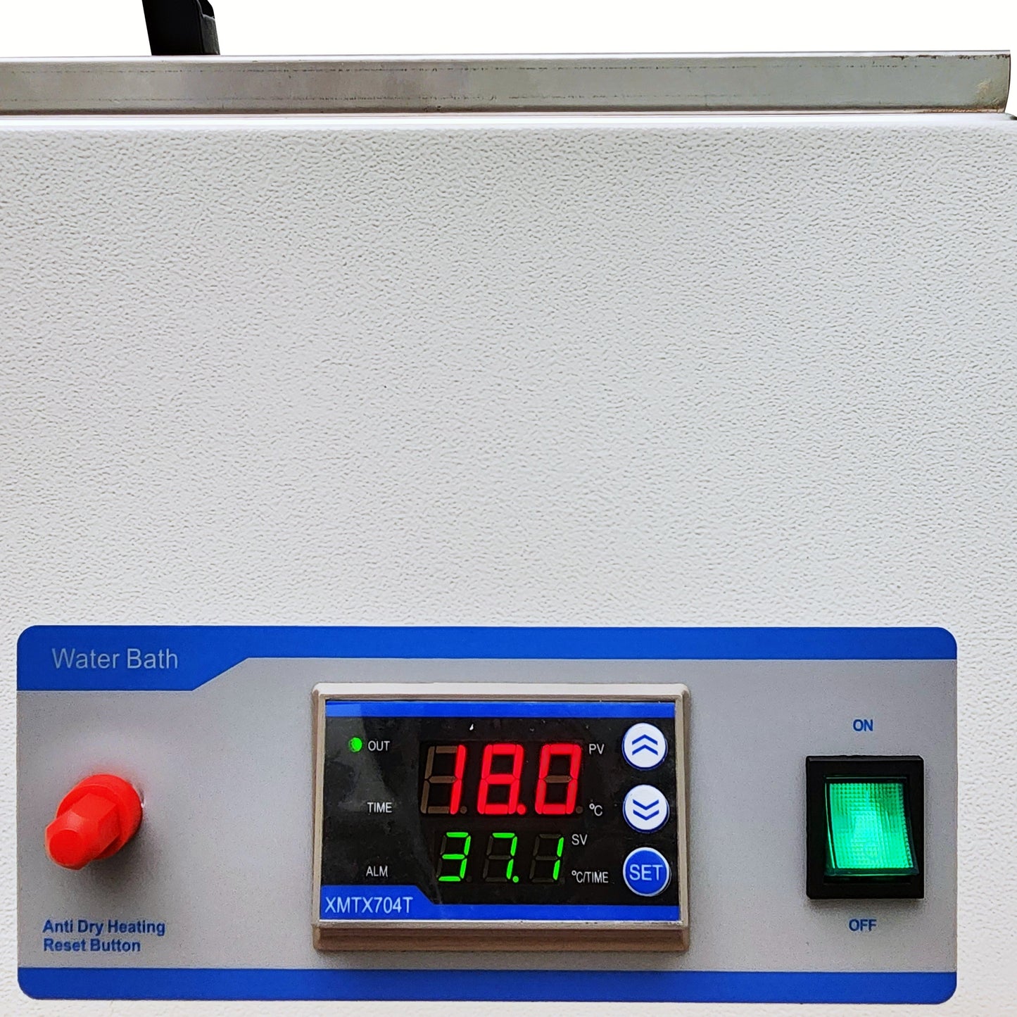 Close-up of a water bath control panel showing digital temperature display (38.0 PV, 37.1 SV), reset button, and power switch.
