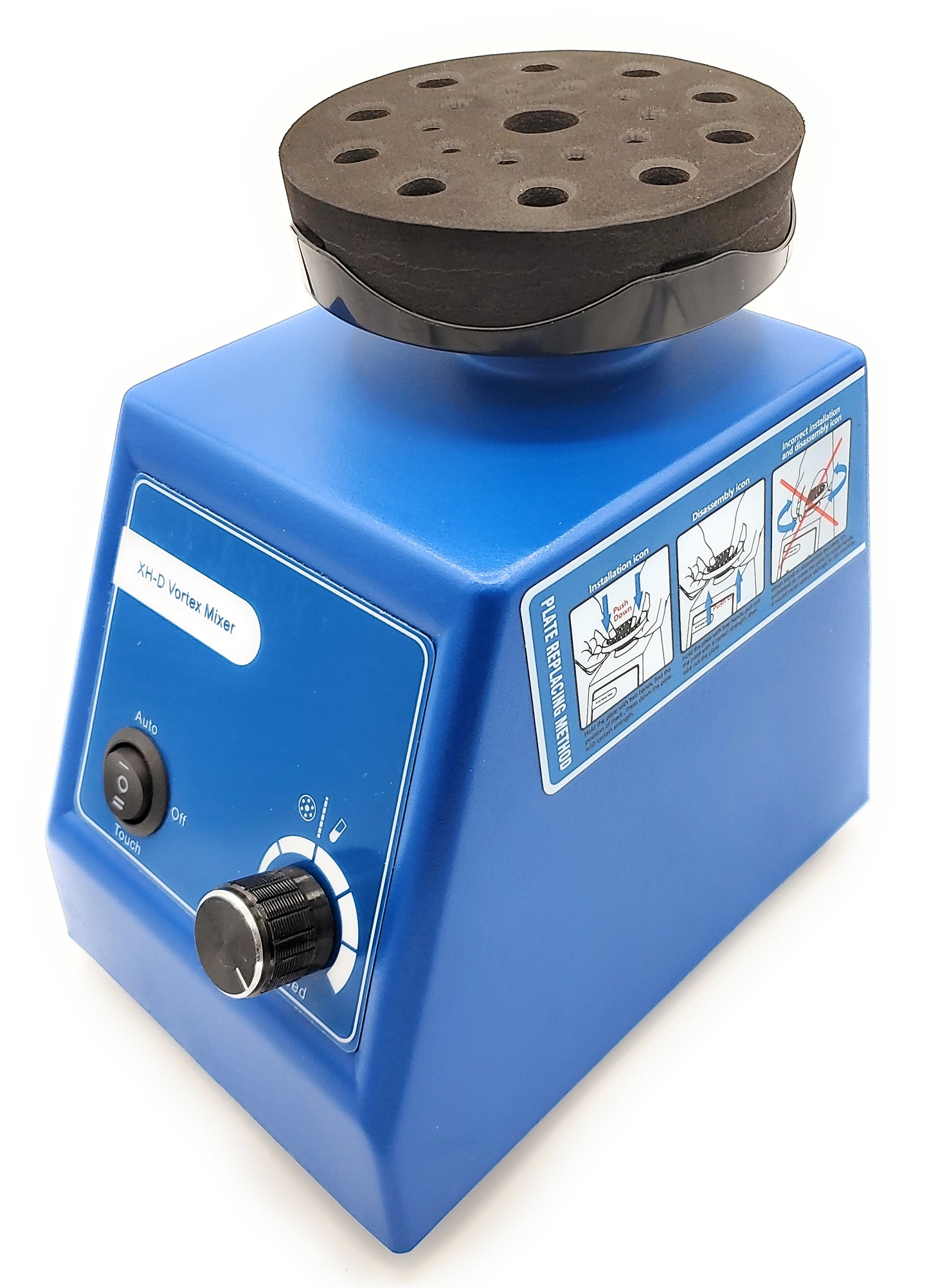 A blue Labnique 4-in-1 Vortex Mixer with a black top. The mixer has a switch labeled "Auto," "Off," and "Touch," as well as a speed dial. A diagram on the side of the mixer shows the plate replacing method. The black top has a foam insert with holes.