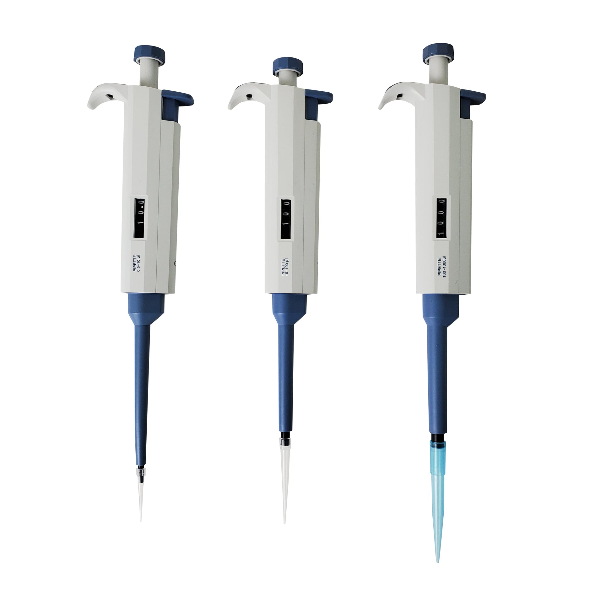 Three Labnique adjustable volume micropipettes of different sizes, 10µl, 100µl, and 1000µl, with tips attached.