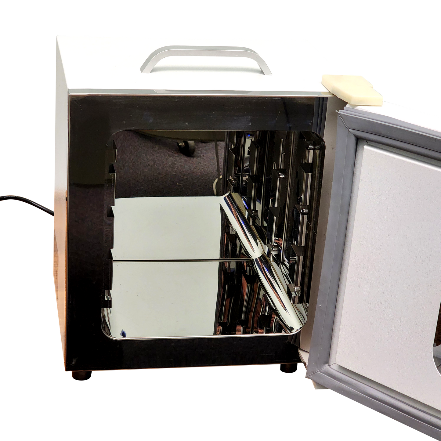 Labnique 10L Microyn digital lab incubator, RT+5 to 65C, door open showing shiny stainless steel interior.
