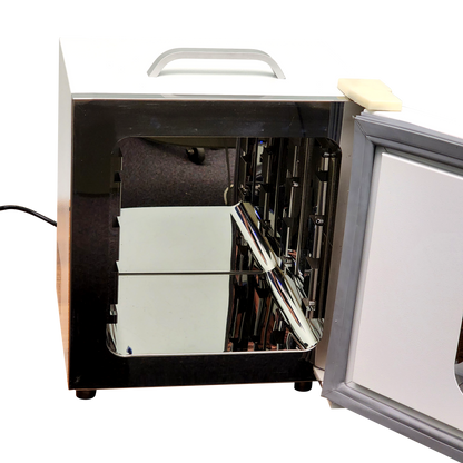 Labnique 10L Microyn digital lab incubator, RT+5 to 65C, door open showing shiny stainless steel interior.