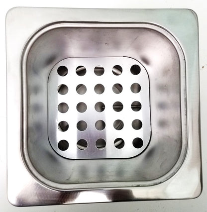 Top-down view of a small, square, stainless steel water bath chamber with a perforated false bottom